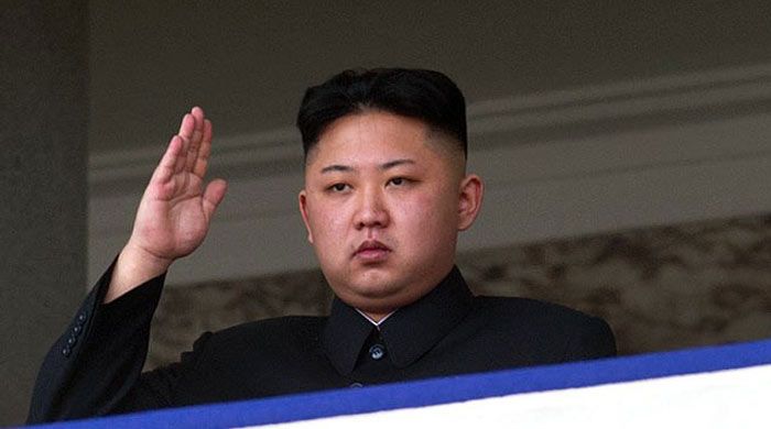 Kim Jong-un, uluslararası ifadelerin olduğu tabelaları kullanın