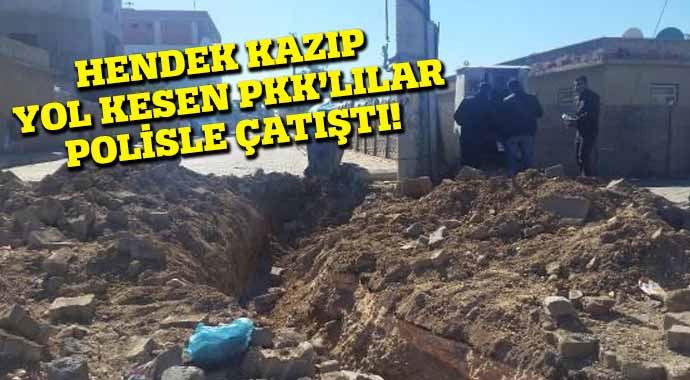Hendek kazıp yol kesen PKK&#039;lılar polisle çatıştı
