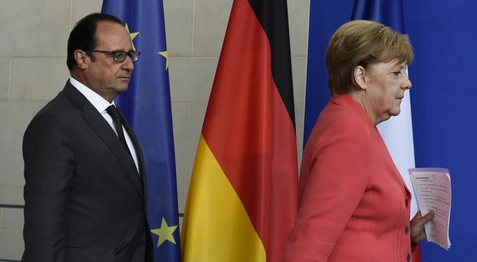 Merkel ve Hollande&#039;dan sığınmacı uyarısı