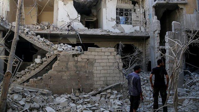 Rejim güçleri, Doğu Guta&#039;da yerleşim alanlarını bombaladı: 7 ölü, 13 yaralı