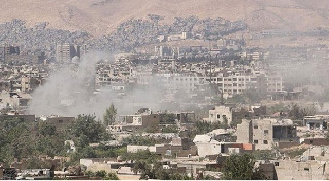 Katil Esad güçleri cenaze törenini vurdu: 17 ölü