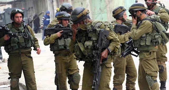 İsrail askerleri şehit ettikleri Filistinli gencin evini yıktı