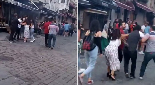 Taksim&#039;de kadınlı ve erkekli kavga