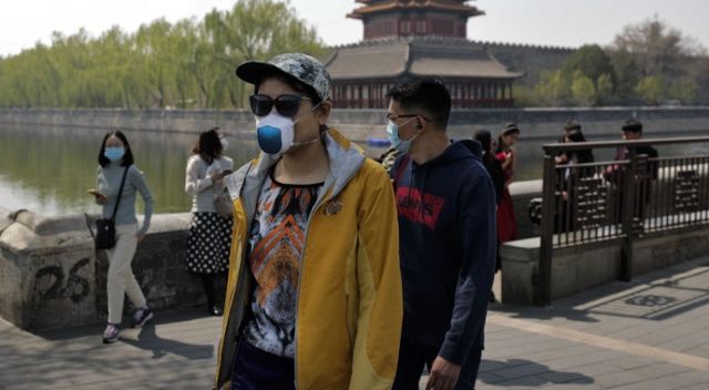 Çin&#039;de korona kısıtlamaları hafifledi, turistik mekanlara ziyaretçi akını oldu