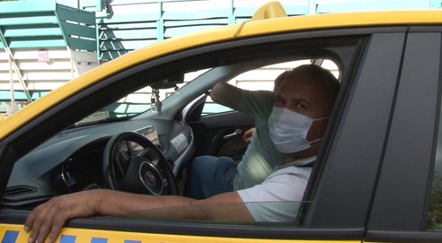 Maskesiz ticari taksiye binen yolcu ceza yemekten kurtulamadı