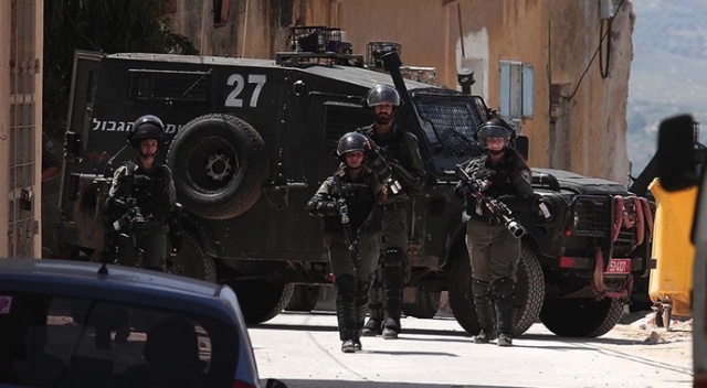 İsrail güçleri 22 Filistinliyi gözaltına aldı