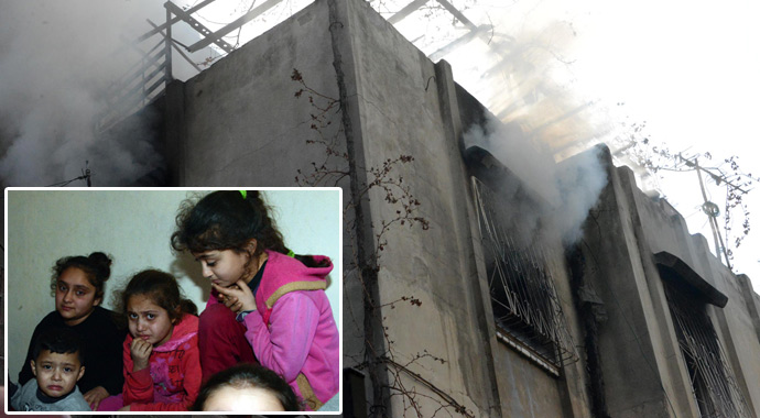 Kahraman anne, 4 çocuğunu alevlerin içinden aldı