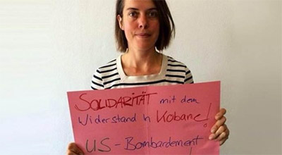 Almanya'yı karıştıran Kobani pankartı
