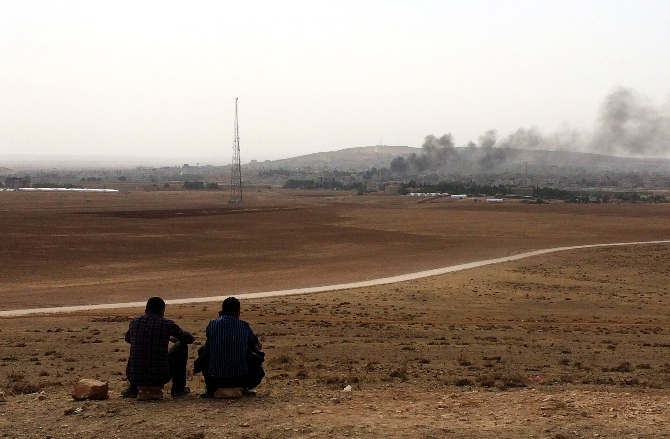 Kobani'yi kara bulutlara teslim oldu