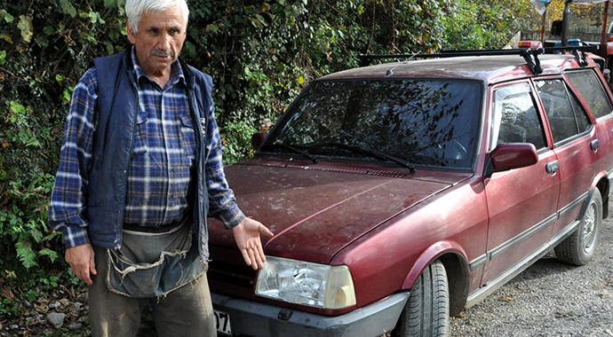 Otomobilin önüne çıkan ayı korkuttu