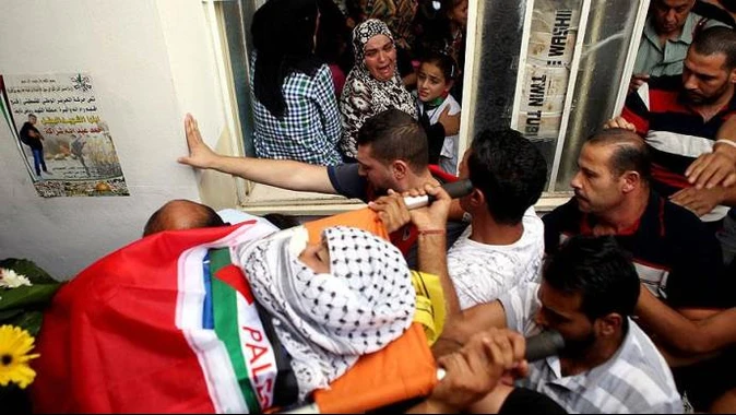 İşgalci İsrail güçlerinin katlettiği Filistinli çocuk toprağa verildi
