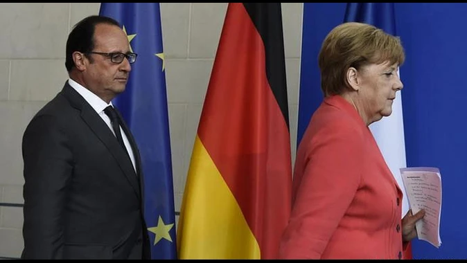 Merkel ve Hollande&#039;dan sığınmacı uyarısı