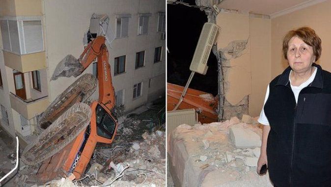 İstanbul&#039;da devrilen iş makinesi evlere zarar verdi