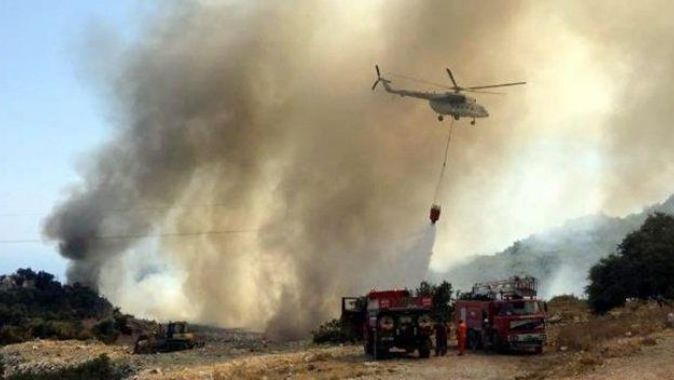 Kumluca&#039;daki orman yangınlarını soğutma çalışmaları sürüyor