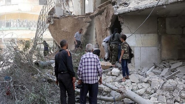 Esed güçleri yerleşim yerini bombaladı: 13 ölü