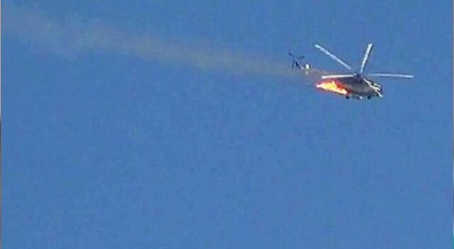 Katil Esad&#039;a büyük şok! Muhalifler helikopter düşürdü