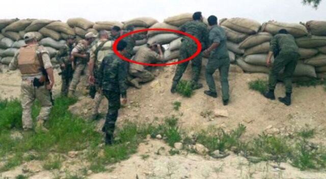 Rus askerleri YPG&#039;li teröristlerin mevzilerinden Türkiye&#039;yi gözetliyor