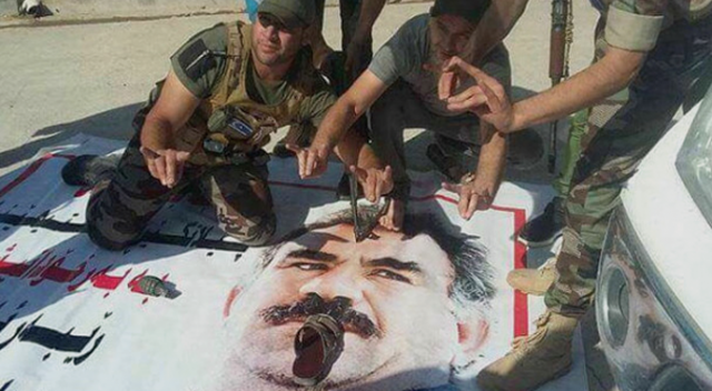 Türkmenler, PKK&#039;nın astığı Öcalan posterlerini söktü