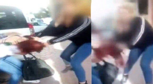 Liseli kızlar, sokak ortasında saç saça baş başa kavga etti