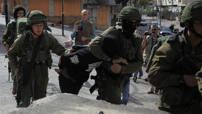 İsrail askerlerinden 13 Filistinliye gözaltı