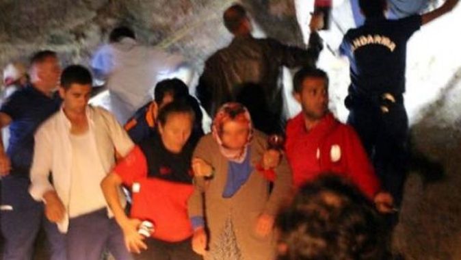 Kayalıklara çıkan kadın 12 saatte kurtarıldı