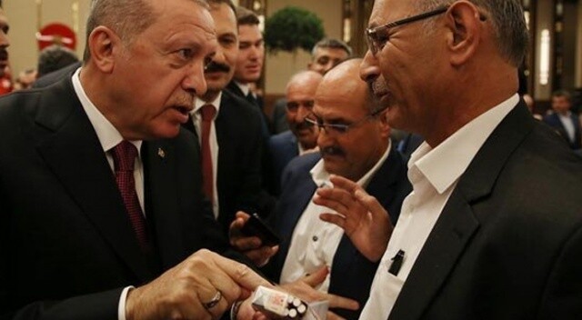 Erdoğan, sigara içen muhtarın paketini aldı