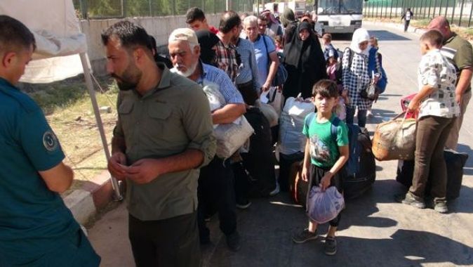 Bayramı ülkesinde geçiren 37 bin Suriyeli, Türkiye&#039;ye döndü