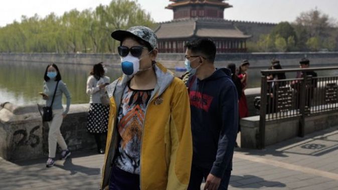 Çin&#039;de korona kısıtlamaları hafifledi, turistik mekanlara ziyaretçi akını oldu