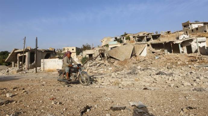 Rus savaş uçakları Hama'da sivilleri vurdu: 4 ölü
Rus savaş uçakları Hama'da sivilleri vurdu: 4 ölü