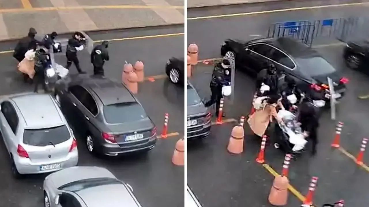 Fırtınaya yakalanan anne ve bebeğe çevik kuvvet kalkanı