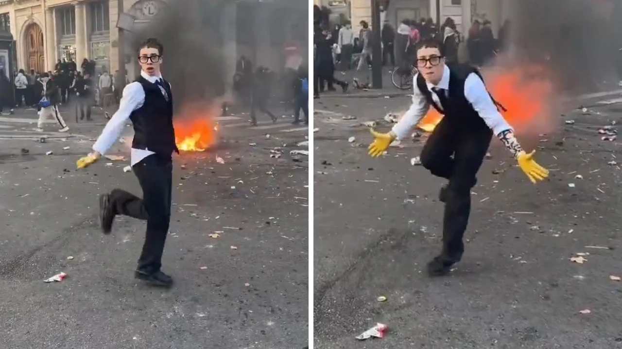 Fransa’da sokaklar yangın yeri! Arkasından alevler yükselirken o böyle dans etti