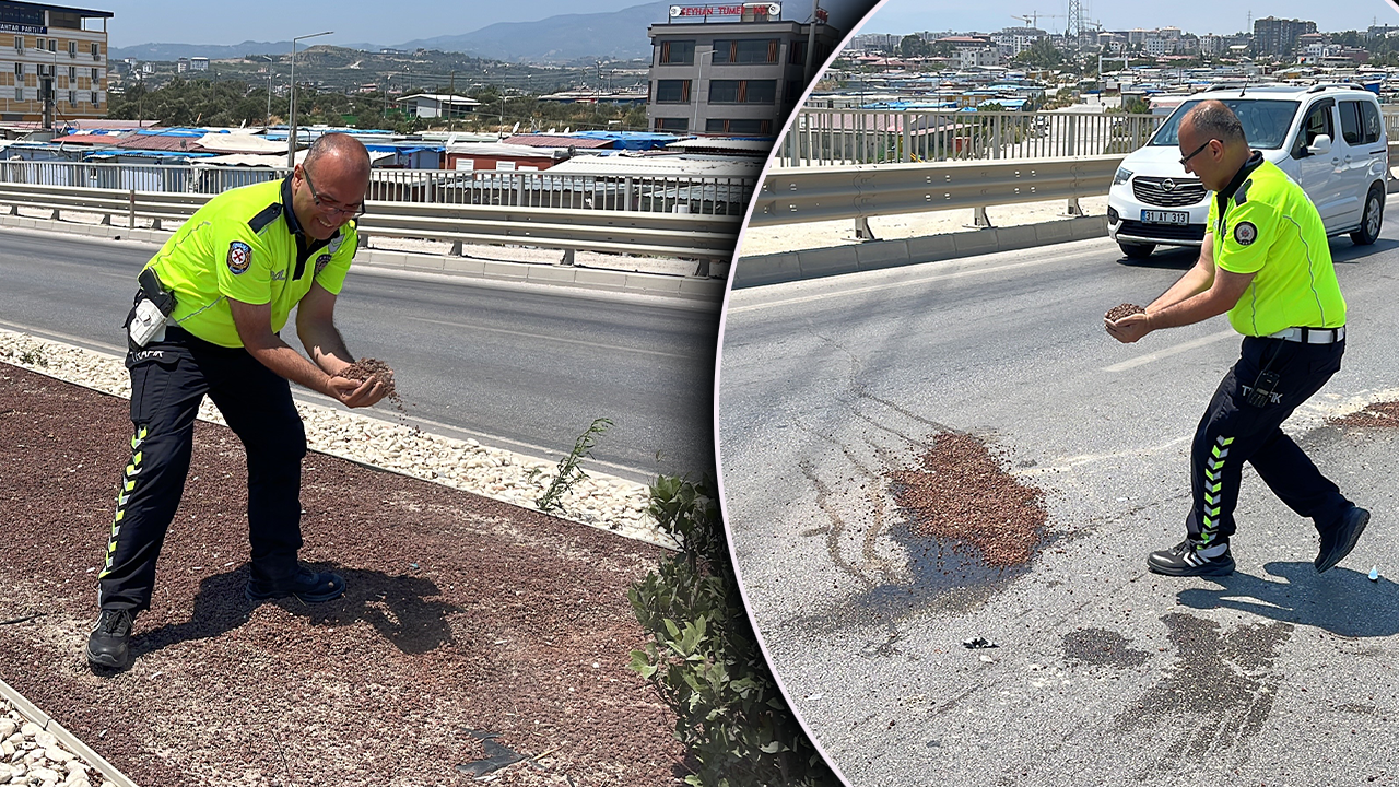 Kaza yerinde polisten takdir toplayan hareket! Yağ dökülen yola avuç avuç kum taşıdı