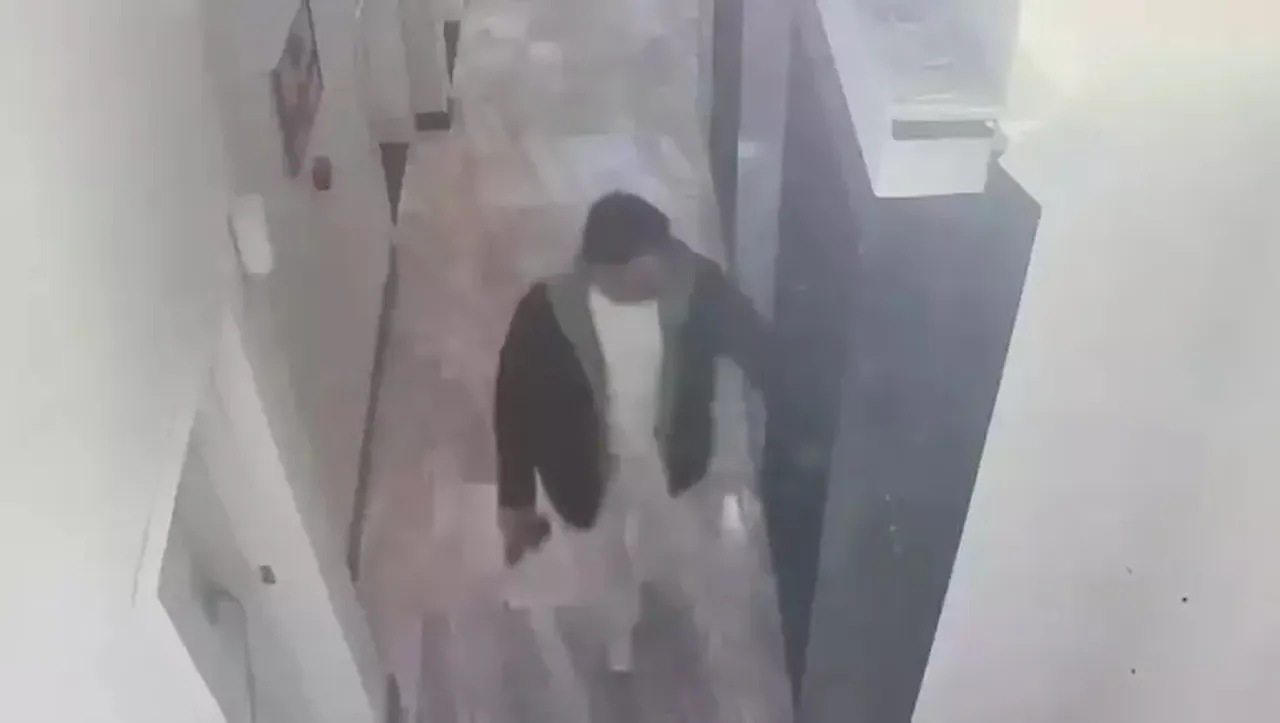 Sunay Kurtuluş'un binaya giriş anı