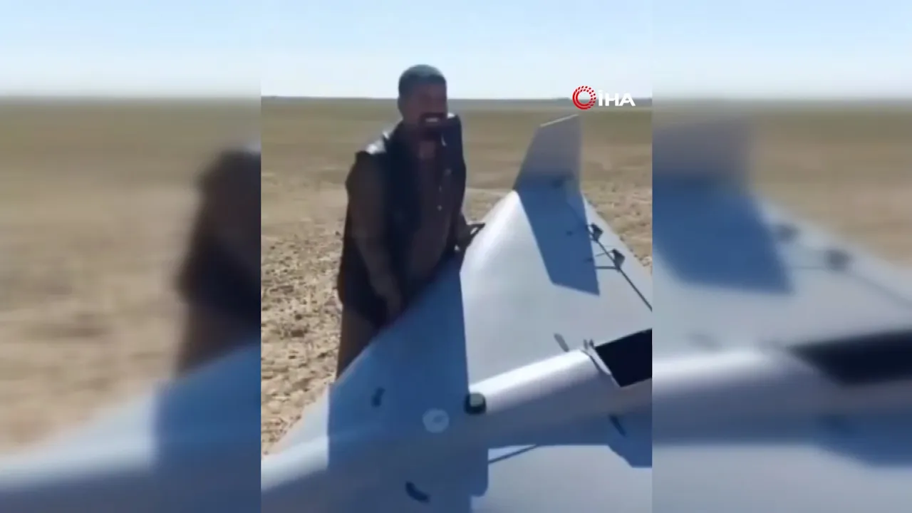 Irak’ta siviller düşen İran İHA’sını araca yükleyerek götürmeye çalıştı! O anlar kamerada