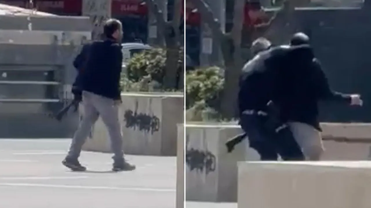 Şehrin göbeğinde tüfekle terör estirdi, polis üstüne atlayarak etkisiz hale getirdi