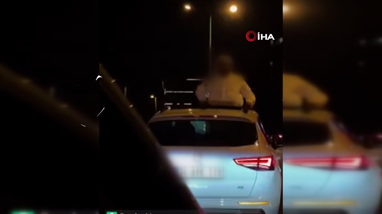 Seyir halindeki araçtan böyle sarktı! Tepki çeken görüntüler affedilmedi
