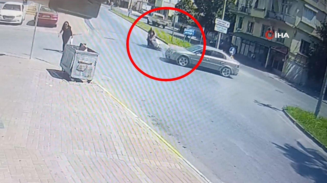 Manavgat'ta motosiklet kazası kamerada! Sürüklenen baba-oğul hem yaralandı hem de 16 bin lira ceza yedi