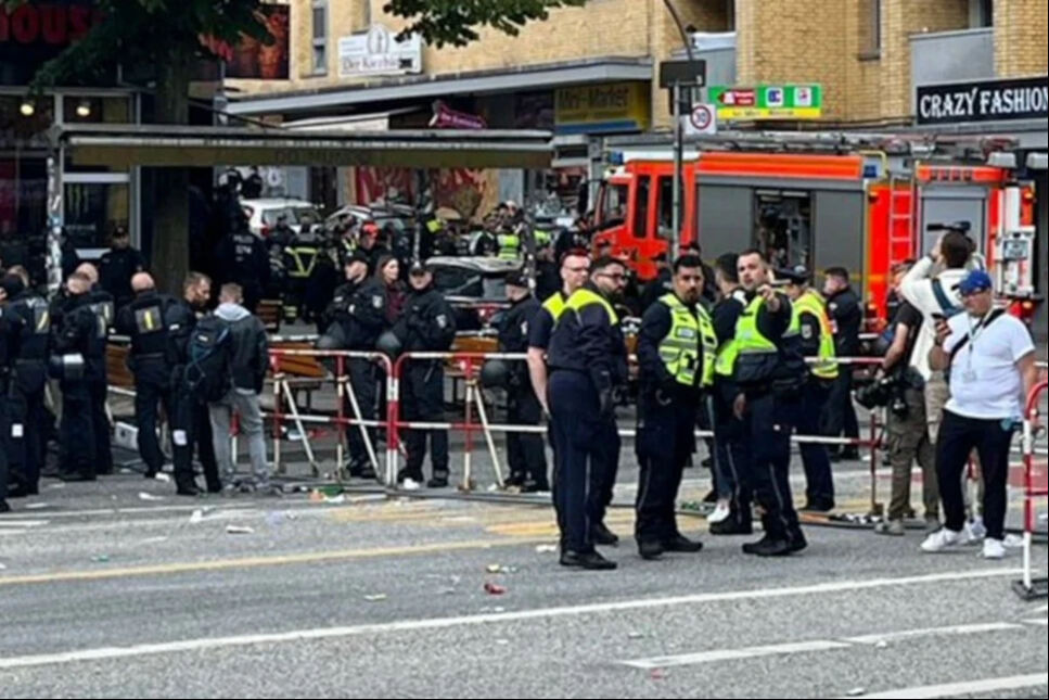 EURO 2024'te baltalı saldırgan polis vurarak etkisiz hale getirdi EURO 2024'te baltalı saldırgan tarafından polis vurarak etkisiz hale getirdi - 1. Resim