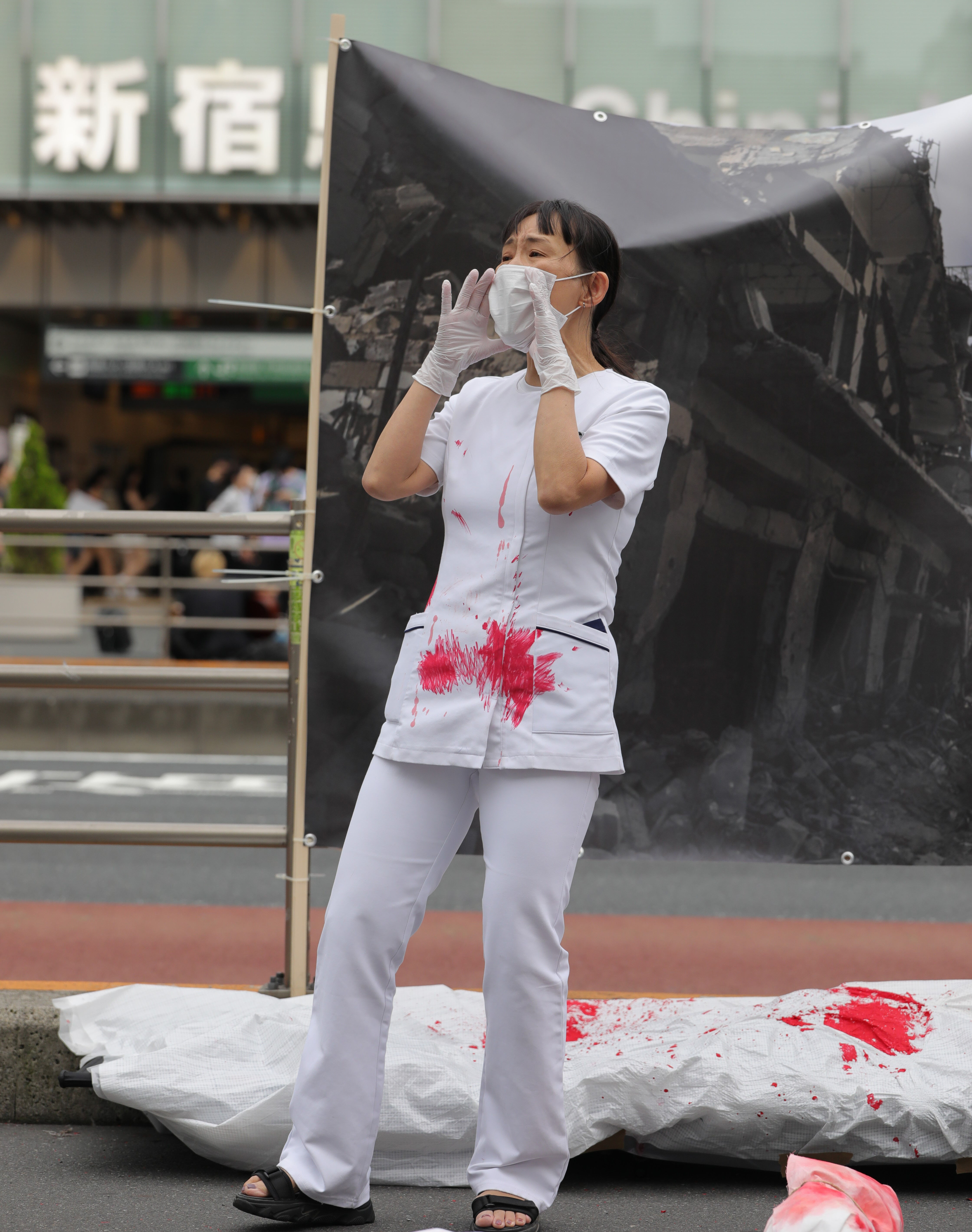 Japonlardan İsrail protestosu! Gazze'de yaşananlar Tokyo'nun merkezinde böyle canlandırıldı Japonlardan İsrail protestosu! Gazze'de yaşananlar Tokyo'nun merkezinde böyle canlandırıldı - 3. Resim