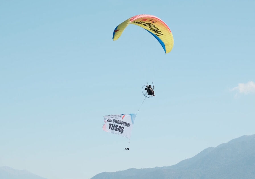 Türk Hava Kurumu'ndan paramotor şovu! Fethiye'de TUSAŞ için uçtular Türk Hava Kurumu'ndan paramotor şovu! Fethiye'de TUSAŞ için uçtular - 1. Resim