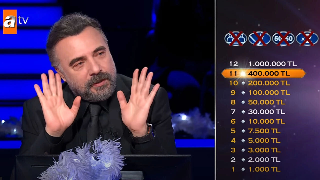 Kim Milyoner Olmak İster sunucusu Oktay Kaynarca'nın saçı peruk mu?    Kim Milyoner Olmak İster sunucusu Oktay Kaynarca'nın saçı peruk mu?    - 1. Resim