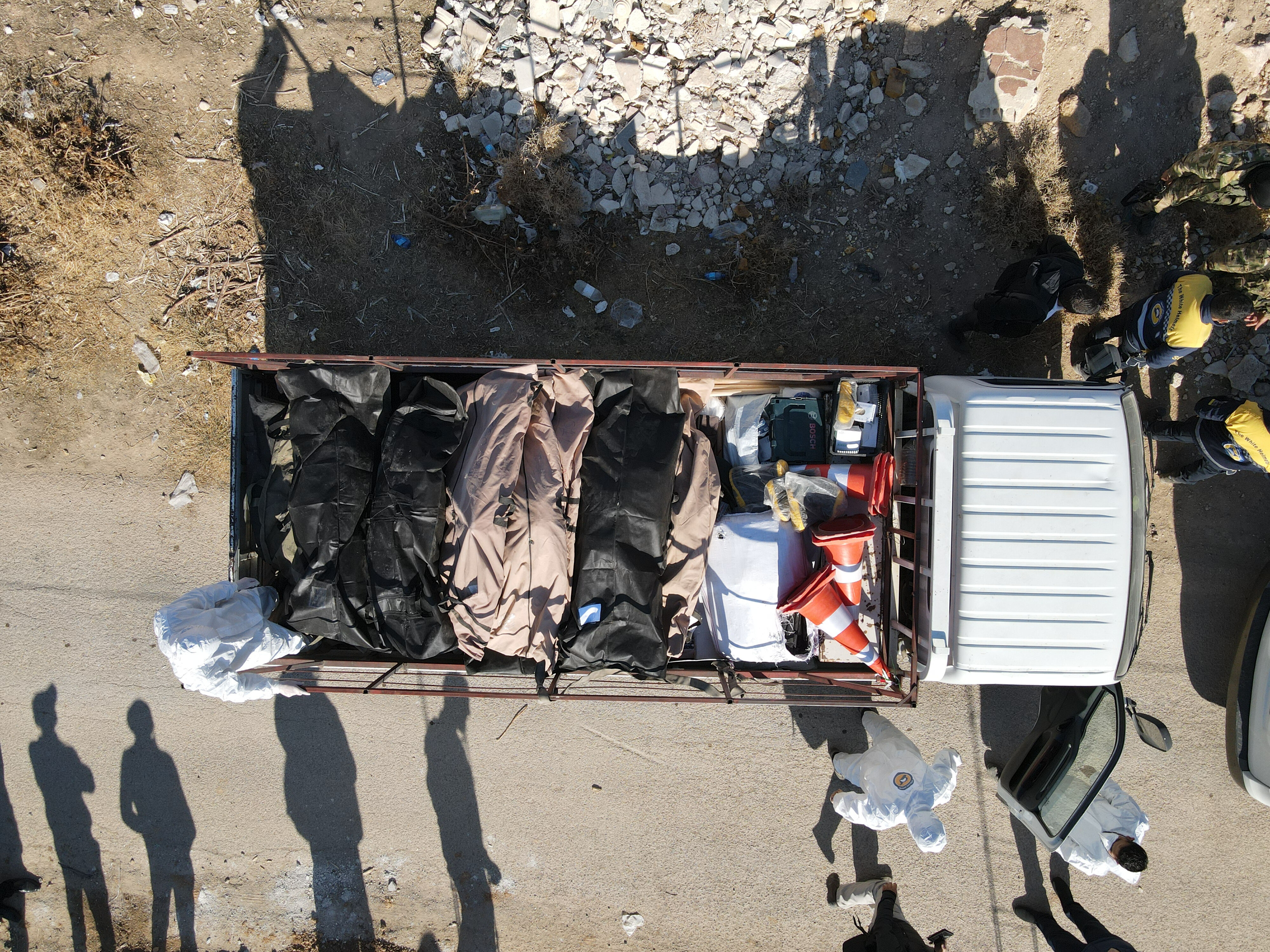 Şam'da 100 bin kişilik toplu mezar bulundu! İşkence edip ezdikten sonra buraya gömmüşler - 1. Resim