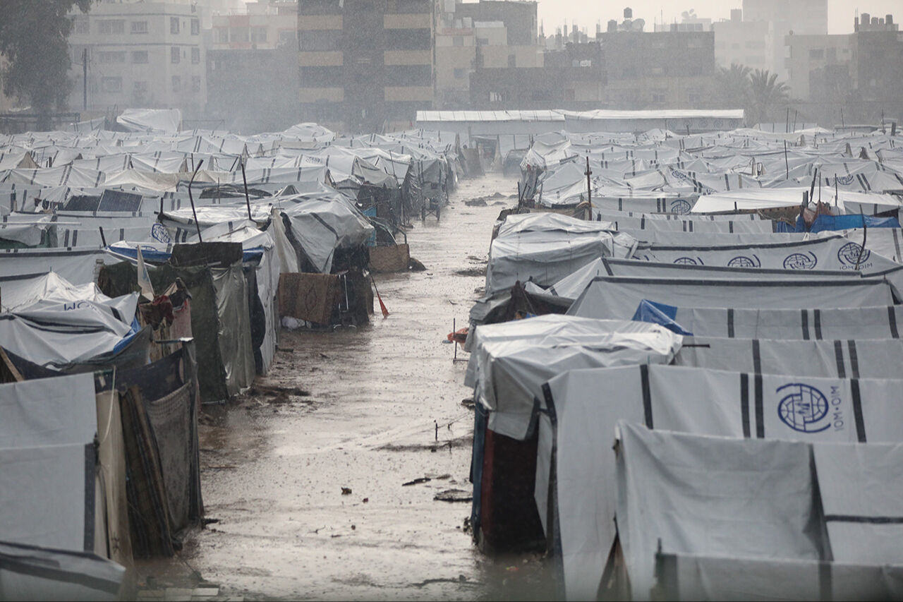 Gazze'de yılbaşı! Filistinlilerin soğukla mücadelesi yağmur altında devam ediyor Gazze'de yılbaşı! Filistinlilerin soğukla mücadelesi yağmur altında devam ediyor - 8. Resim