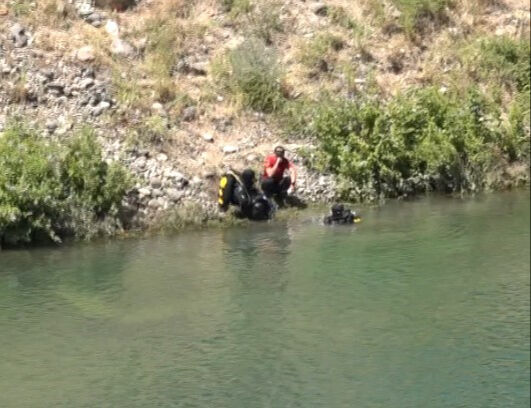 Kayıp gencin cesedi, baraj gölüne uçmuş araçta bulundu Kayıp gencin cesedi, baraj gölüne uçmuş araçta bulundu - 1. Resim