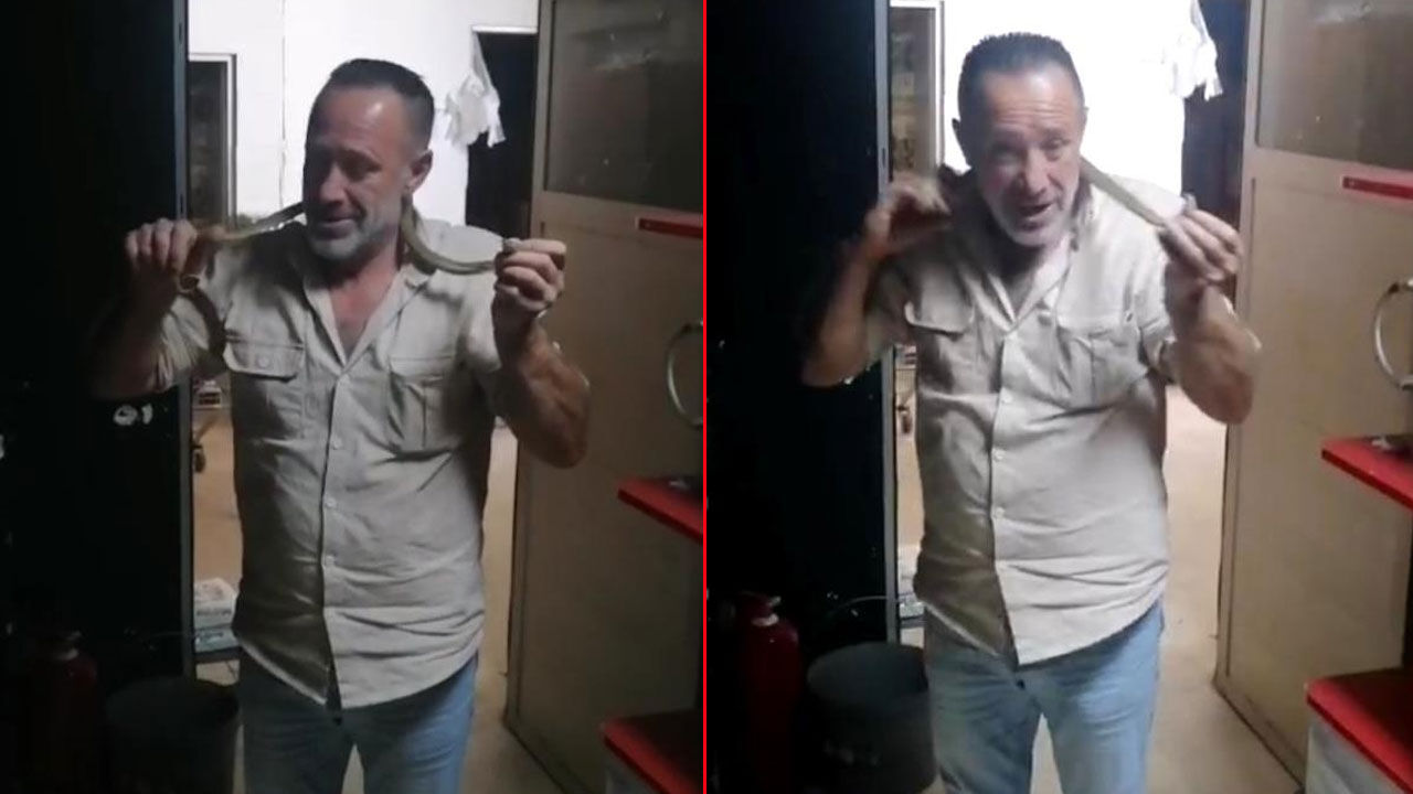 Yürek hoplatan anlar! 2 metrelik yılanla dost oldu, ‘kanka’ deyip boynuna doladı - 1. Resim