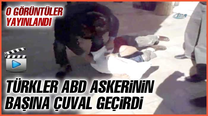 Amerikan askerinin başına çuval geçirdiler