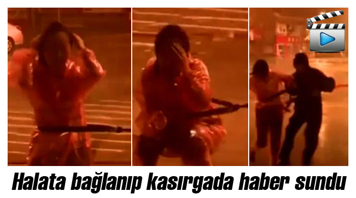 Kadın muhabiri kasırga bile durduramadı Kadın muhabiri kasırga bile durduramadı