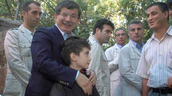 Davutoğlu: Yüreğimiz yanıyor