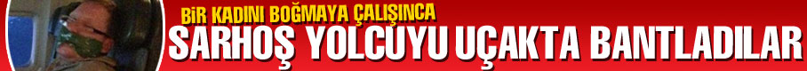 Sarhoş yolcuyu uçakta bantladılar Sarhoş yolcuyu uçakta bantladılar
