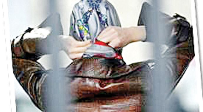 'Başı açık' kararına durdurma 'Başı açık' kararına durdurma